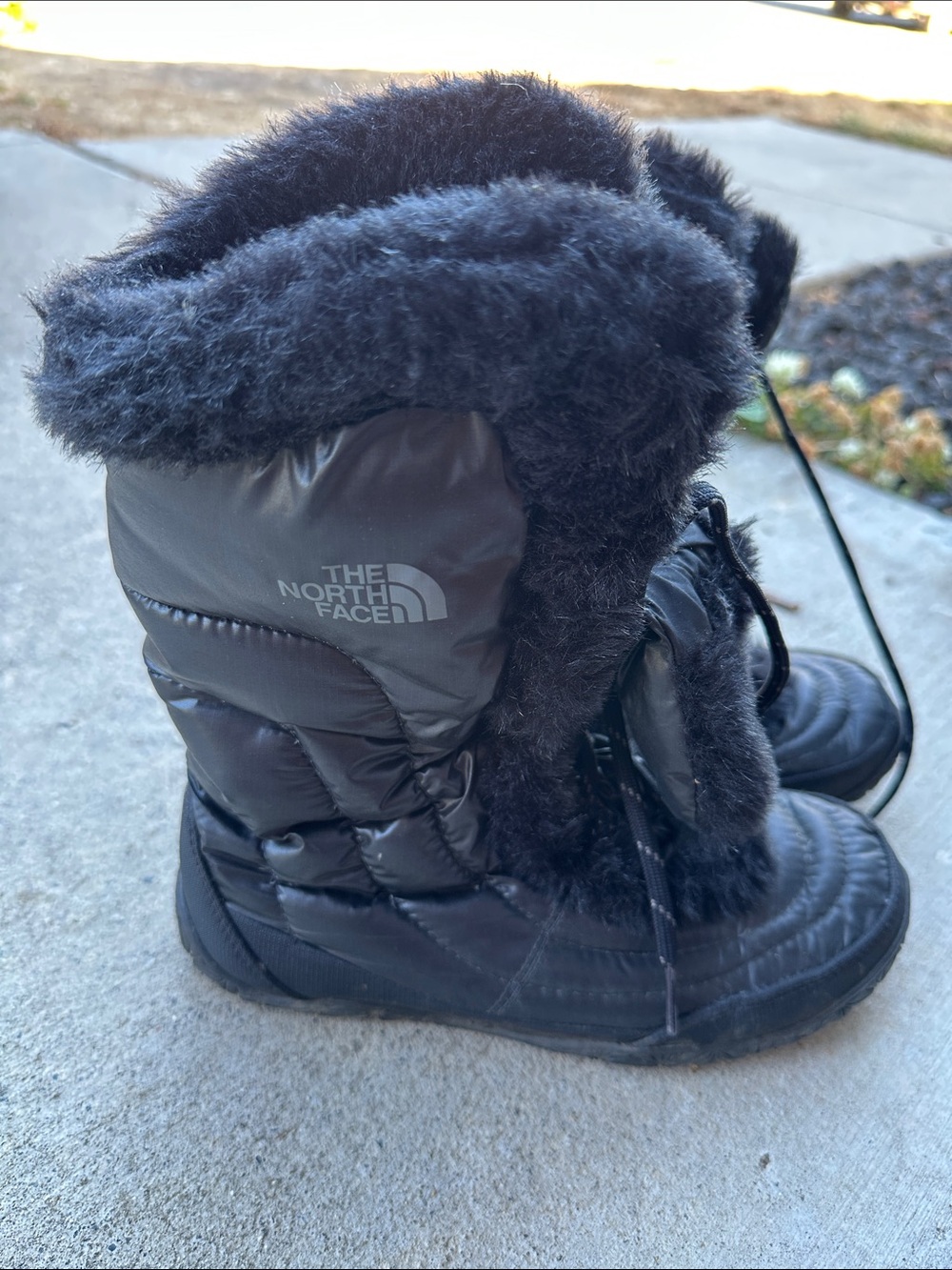 The North Face Black Faux-Fur Winter Boots
- Womens